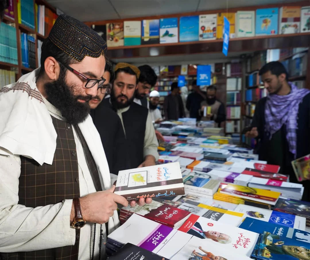 Reviewing books at a cultural exhibition