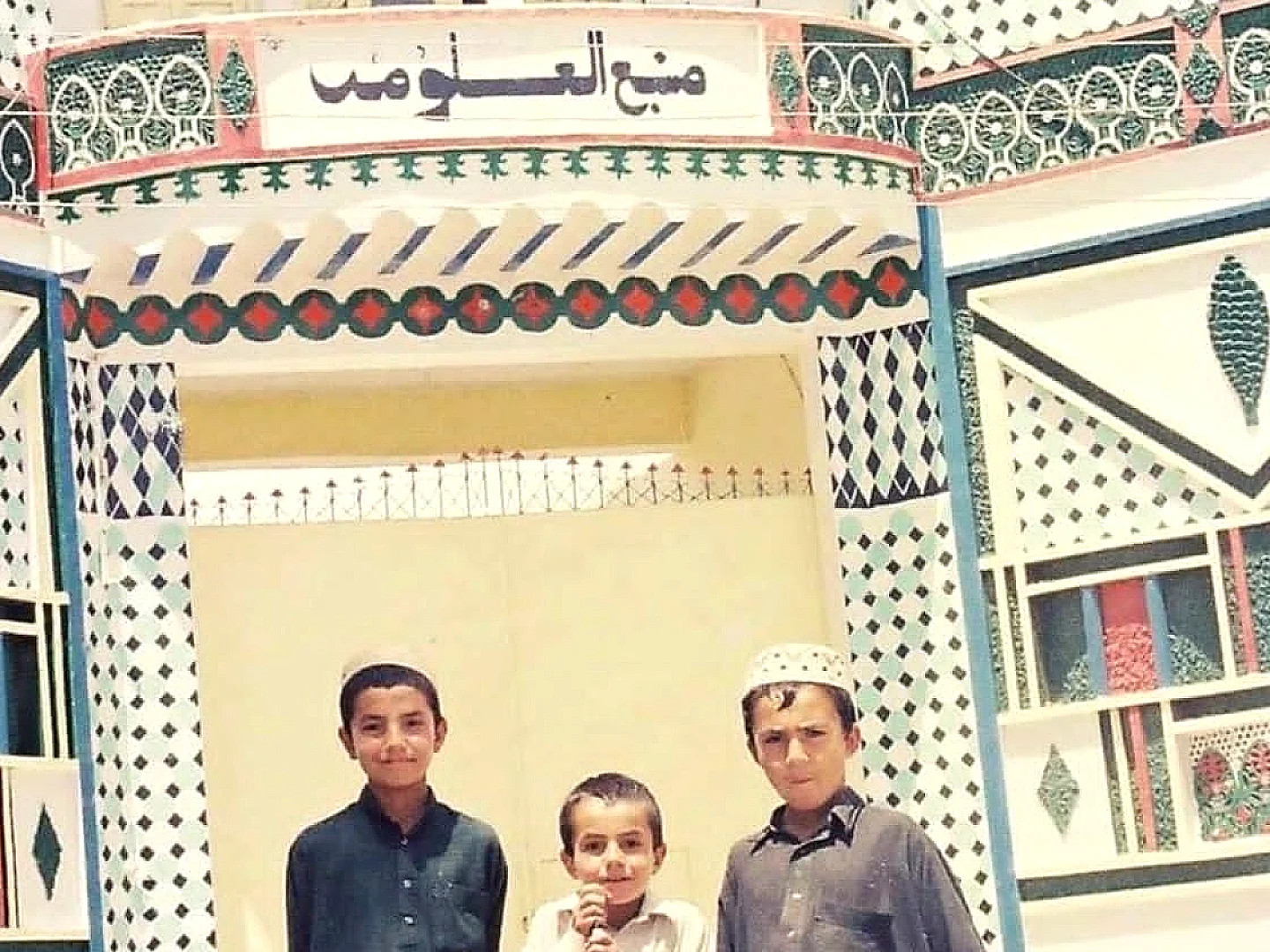 Martyr Omar Haqqani and Anas Haqqani with their childhood friend outside Manba-ul-Uloom Madrasa